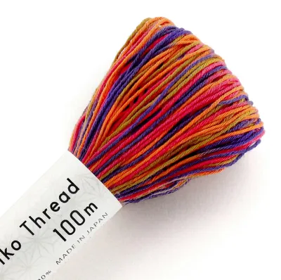 Produktbild von Olympus Sashiko Garn, Baumwolle, Strang, ca 100m, Farbe 174, Mischfarbe, Feuer, hergestellt in Japan