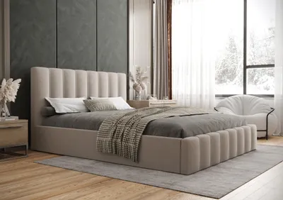 A bedroom scene with a bed, nightstand, and chair.