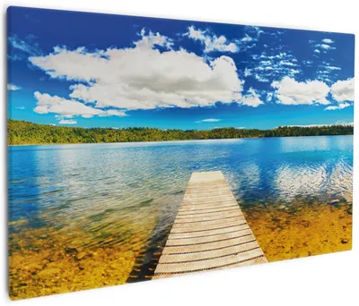 Produktbild von Wallario Premium Leinwandbild Klarer See mit Steg - Blauer Himmel in Größe 60 x 90 cm