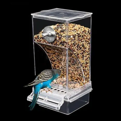 Productafbeelding van Unyqoos® Transparante, automatische vogelvoederautomaat met een plastic zitstok, geschikt voor kleine tot middelgrote vogels – zoals parkieten en kanaries