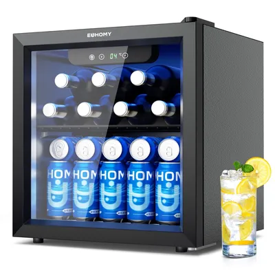 A mini beverage cooler filled with bottles and cans, with a glass of lemonade on the side.