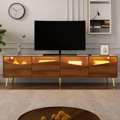 Produktbild von Fortuna Lai TV-Schrank 180 x 40 x 50 cm mit LED-Beleuchtung – Holzfarbener, Goldene Metallfüße, Glasfront und Stauraum – Lowboard für Wohnzimmer