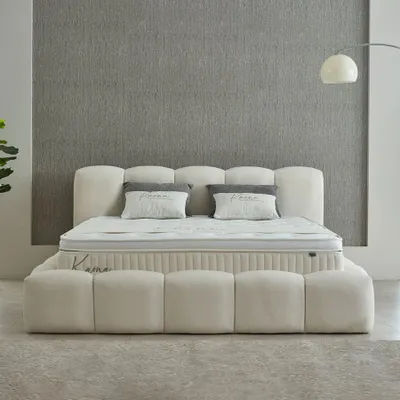 Produktbild von Boxspringbett Kaona 140 x 200 cm mit 2 Poof Cremebeige Voll-orthopädisches Komfortbett mit Bettkasten, inkl. Lieferung und Montage