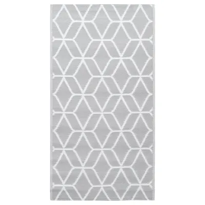 A flat lay of a rectangular rug with a geometric pattern.