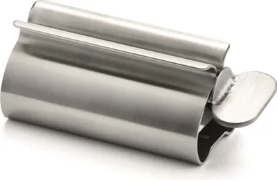 A close-up studio shot of a stainless steel tube squeezer.