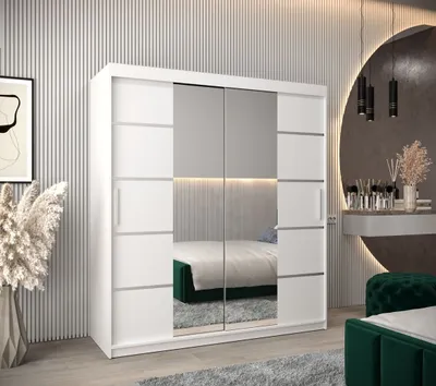 A modern bedroom with a large white wardrobe with mirrored doors.