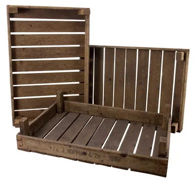 Three wooden crates are arranged in a studio setting against a white background.
