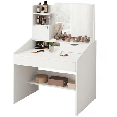 A white vanity table with a mirror and various makeup products on it.
