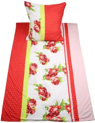 A folded bedding set with a pillow on top.