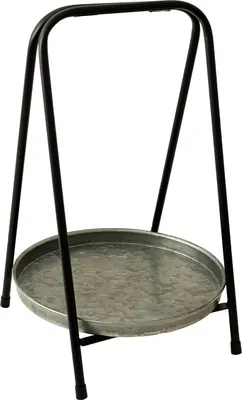 A metal plant stand with a round tray.