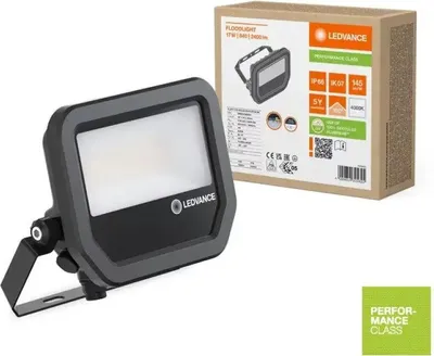 A floodlight and its packaging are shown against a white background.