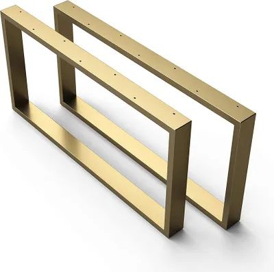 Two gold-colored rectangular table legs are shown against a white background.