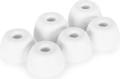 A group of white silicone earbud tips arranged on a white background.