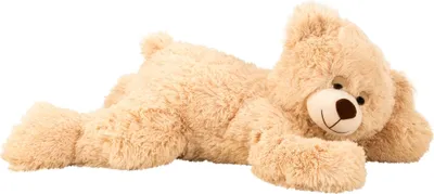 A plush teddy bear lying on its side.