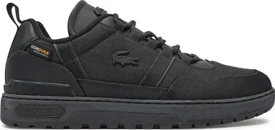 A studio shot of a black Lacoste sneaker.