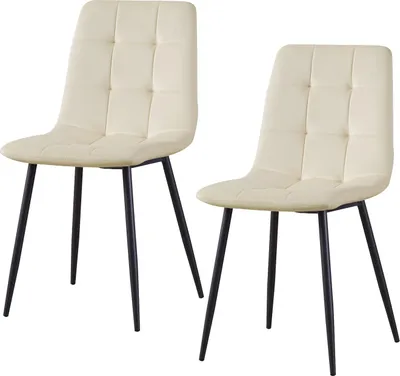 Two cream-colored chairs with black legs on a white background.