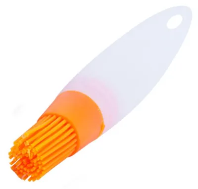 Imagen del producto de Dispensador de salsa de silicona con cepillo y tapa reutilizable
