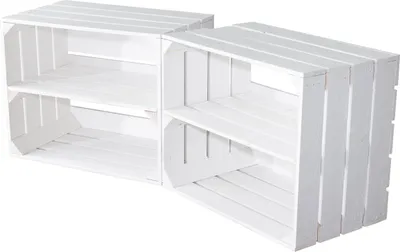 Two white wooden crates with shelves, placed side-by-side.
