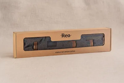 A product box with a window showing bathroom hooks inside.