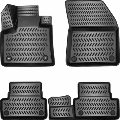 A collage of four black rubber car floor mats.