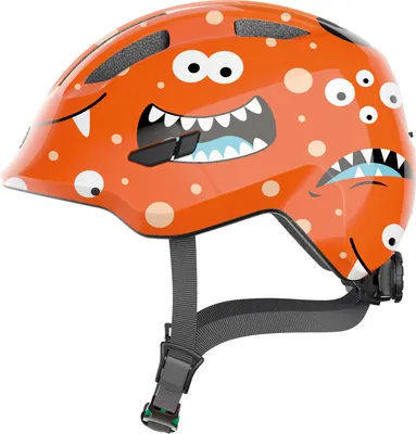Produktbild von ABUS Kinderhelm Smiley 3.0 - Fahrradhelm mit tiefer Passform, kindergerechten Designs & Platz für einen Zopf - für Mädchen und Jungs - Orange mit Monster-Muster, Größe M (50-55 cm)
