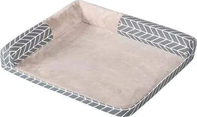 A pet bed with a geometric pattern on the sides and a soft beige interior.