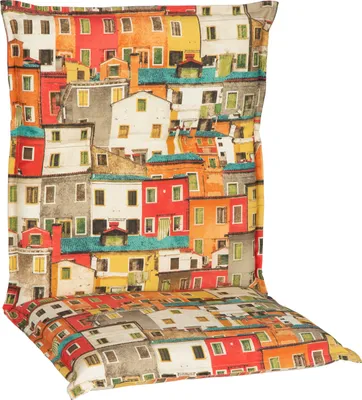 A close-up of a cushion with a colorful print of buildings.