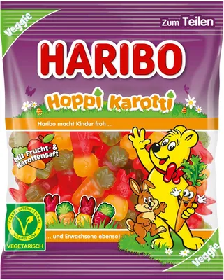 A bag of Haribo Hoppi Karotti gummy candies, featuring cartoon characters and product information.