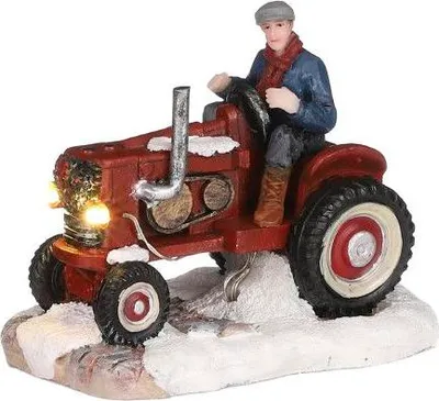 Produktbild von Batteriebetriebener Ackerschlepper mit den Maßen 9 cm Länge, 6,5 cm Breite und 7 cm Höhe