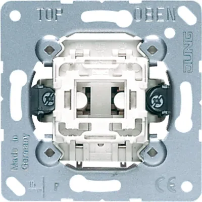 The back of a light switch mechanism with mounting bracket.