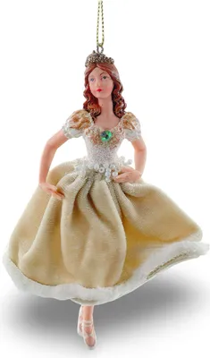 A decorative ballerina ornament hanging from a string.