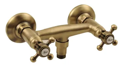 A bronze-colored faucet with two cross-shaped handles, mounted on a white background.