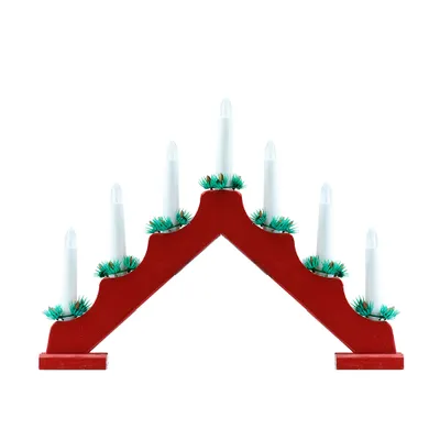 A red candle holder with white candles and green decorative elements, isolated on a white background.