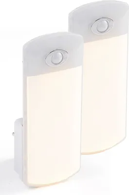 Two white LED night lights with motion sensors are shown plugged into an outlet.
