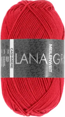 A ball of red yarn with a label wrapped around it.