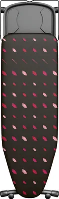 An ironing board with a patterned cover.