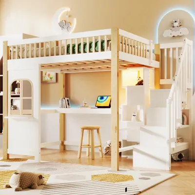 A child's loft bed with a desk and stairs, set up in a room with decorative elements.