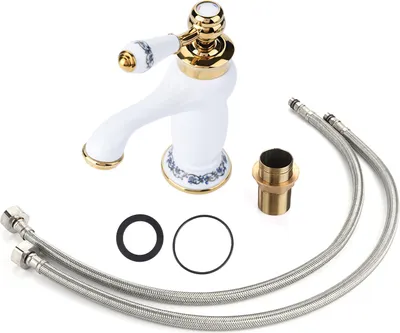 A white and gold single-handle faucet with blue floral accents, along with its accessories, laid out on a white background.