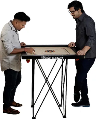 Two men playing carrom on a foldable carrom board.