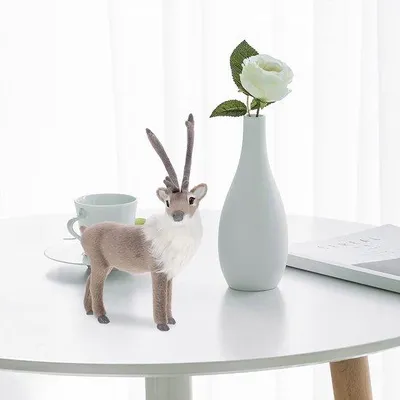 Productafbeelding van Unyqoos® Realistisch elkenbeeld – Decoratiefiguur van kunstwol en kunststof, 20 cm, geschikt voor woon-, kantoor- en kerstdecoratie