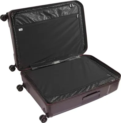 An open suitcase with its interior visible, against a white background.