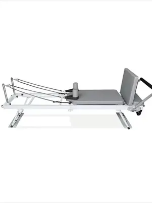 Produktbild von Pilates Reformer - Studio-Trainingsgerät - Verstellbarer Widerstand - Stahlrahmen - Rutschfest - Bis 250 kg - Mit Pedal und Federn, quadratische Box - Beige