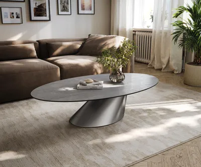 Produktbild von DELIFE Couchtisch Edge Oval 140x80 cm Keramik Beton Grau Conis Edelstahl gebürstet