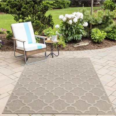 Zdjęcie produktu dla Dywan zewnętrzny, odporny na warunki atmosferyczne, prostokątny, o wymiarach 200x290 cm, w kolorze beżowym, idealny do użytku na zewnątrz, w ogrodzie, na kempingu lub wewnątrz, w stylu skandynawskim