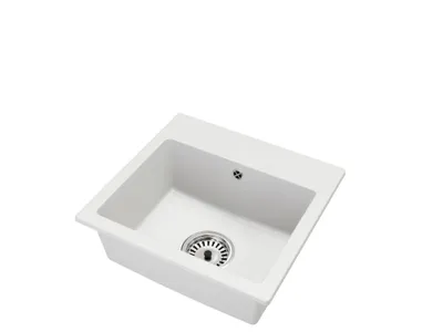 A white kitchen sink shown from a slightly elevated angle against a white background.