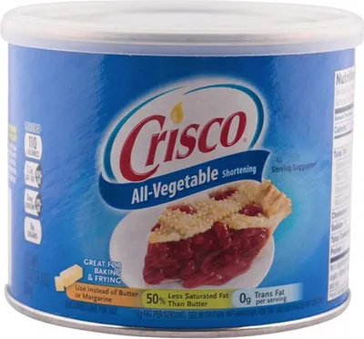 A can of Crisco All-Vegetable Shortening with a slice of pie on the label.