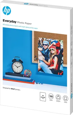 A product box for HP Everyday Photo Paper, showing a lifestyle image of a couple on the front.