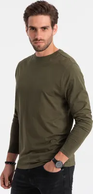 A man wearing a long-sleeved t-shirt.