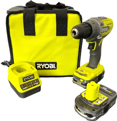 A cordless drill, battery, charger, and storage bag are arranged on a white background.