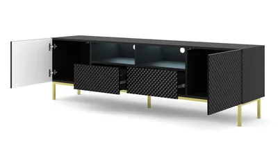 A black TV stand with gold legs is shown with its doors and drawers open.